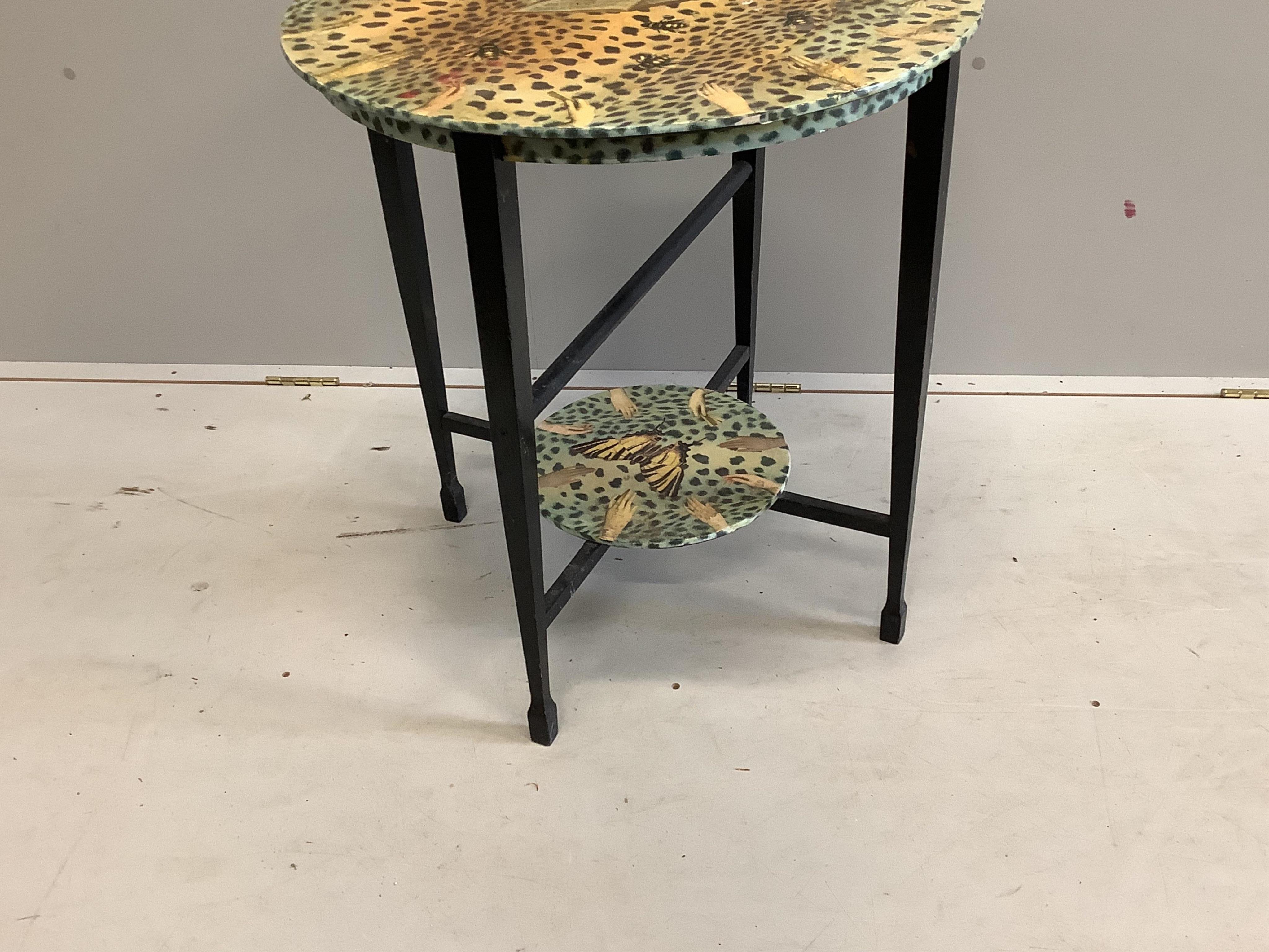 Julia Black, a decoupage faux leopard print two tier table, diameter 62cm, height 66cm. Condition - fair